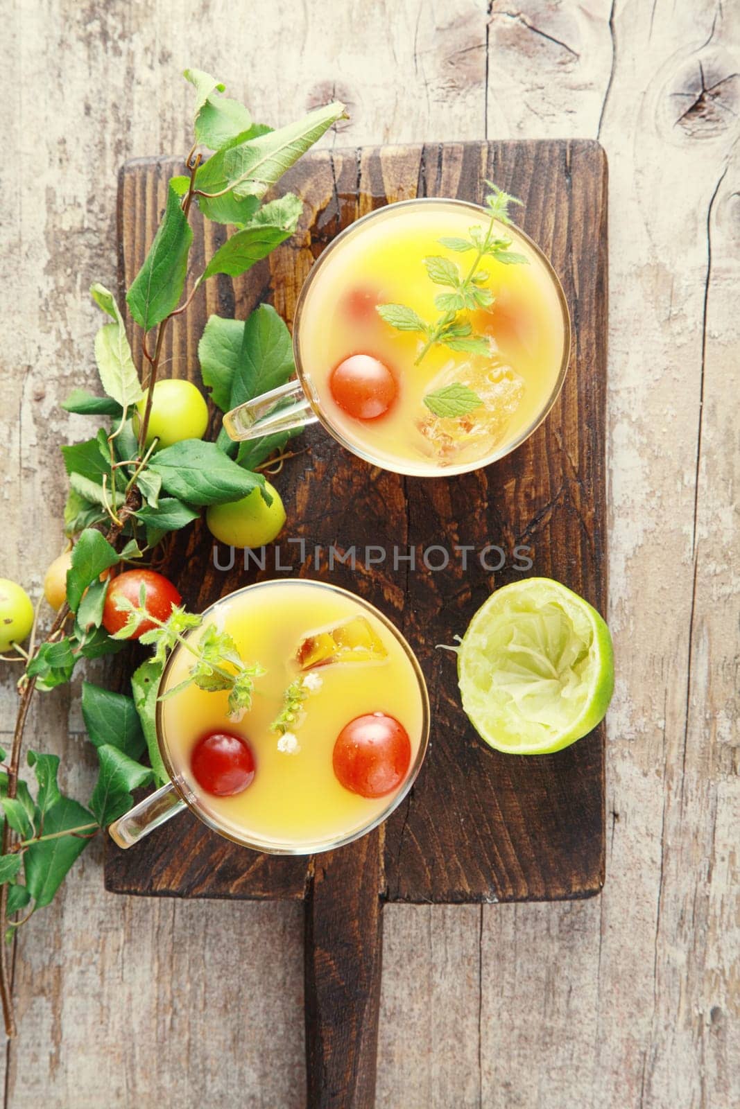 High Angle View Fresh Fruit Juice Glasses on Wooden Platform