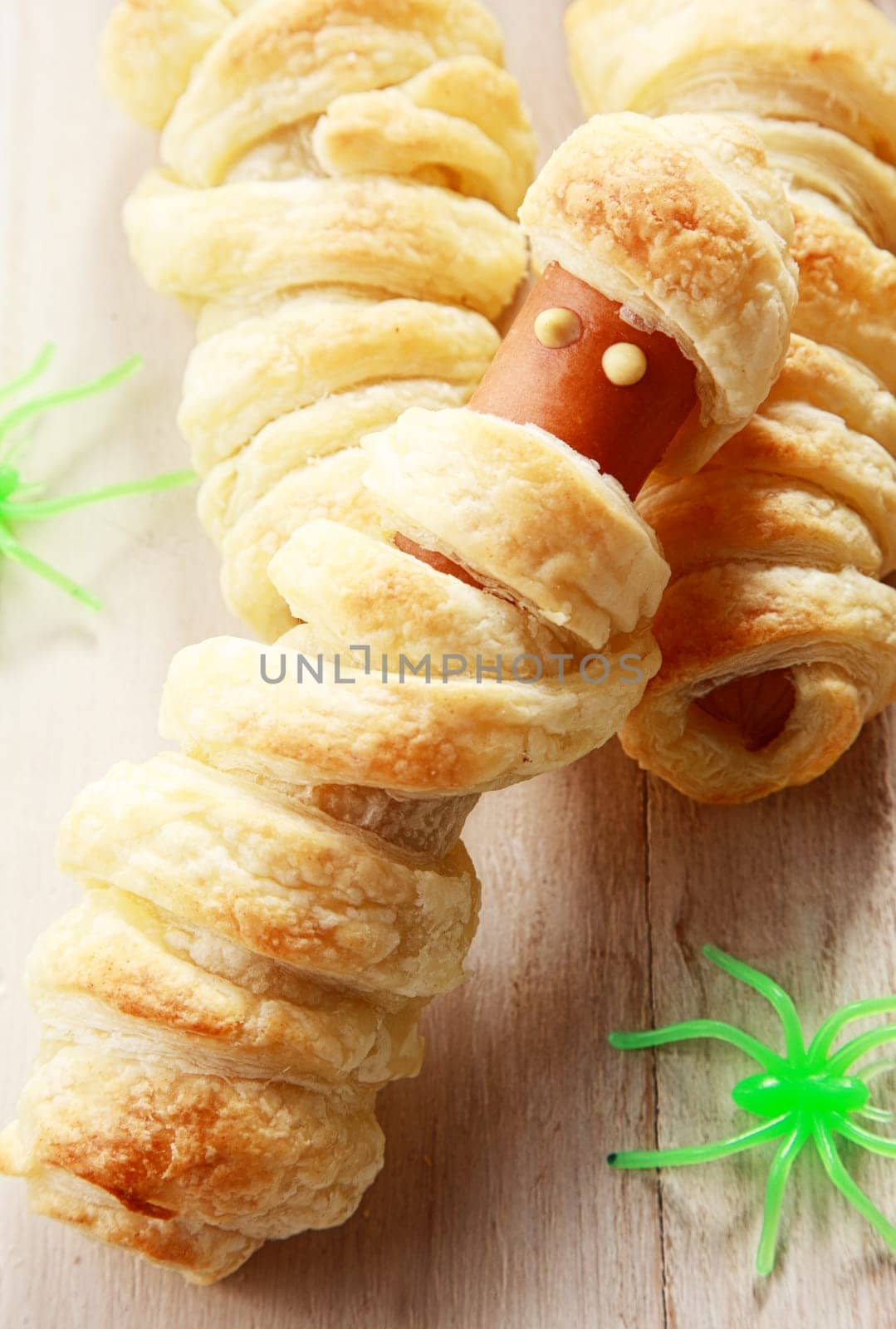 Halloween Appetizer of Weiner Wrapped in Pastry to Look Like a Mummy