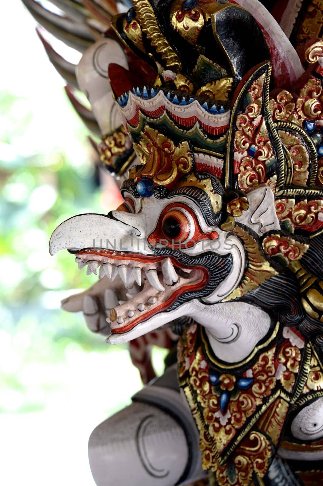 A close up shot of a Balinese statue