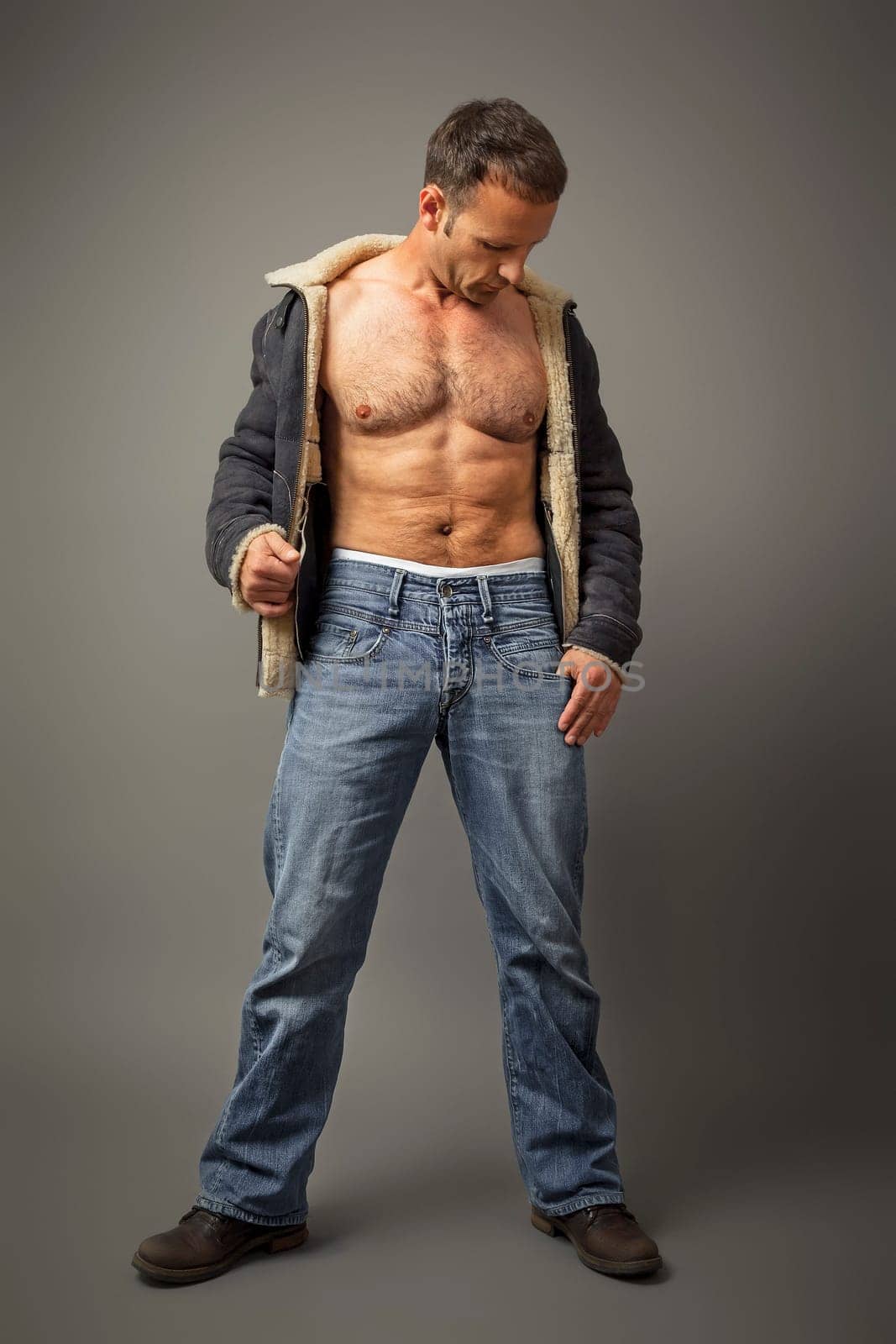 An image of a handsome muscle man
