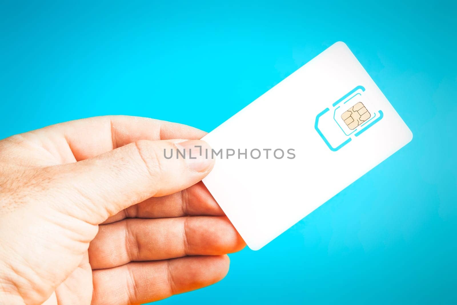 A man holding a blank smart card