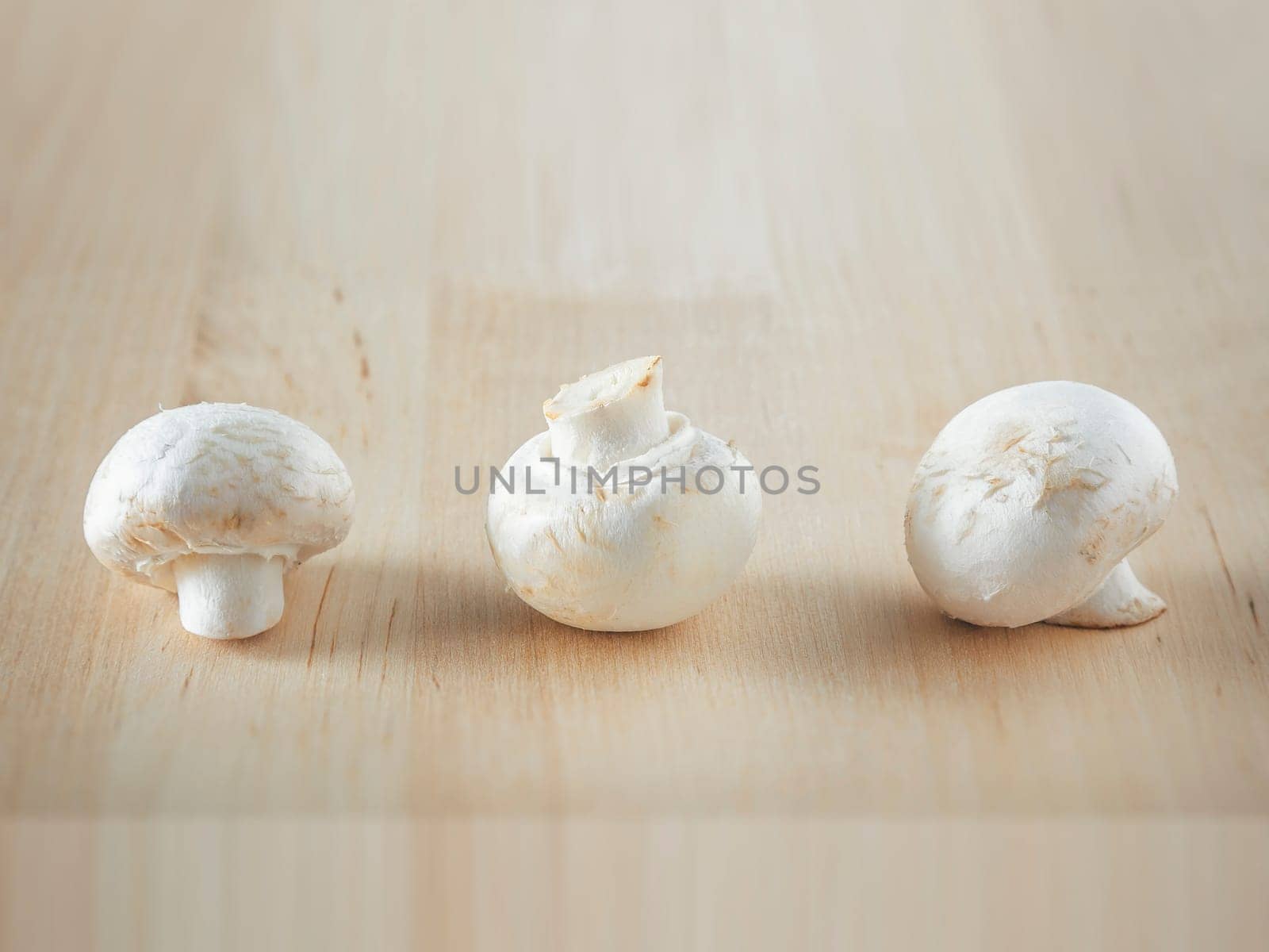 An image of three mushroom in a row