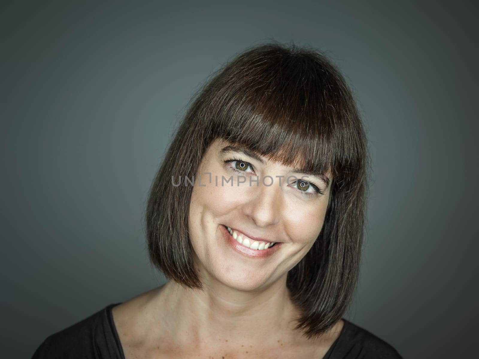 An image of a beautiful smiling woman