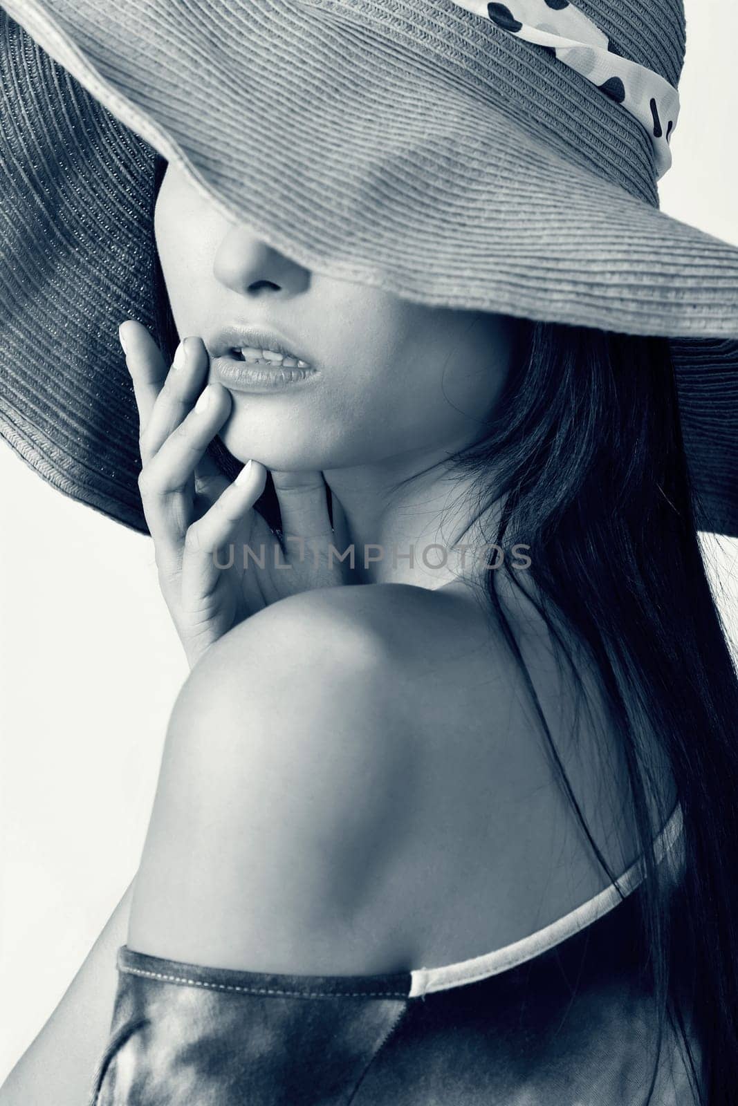 Glamour of Asian beauty with hat, closeup portrait.