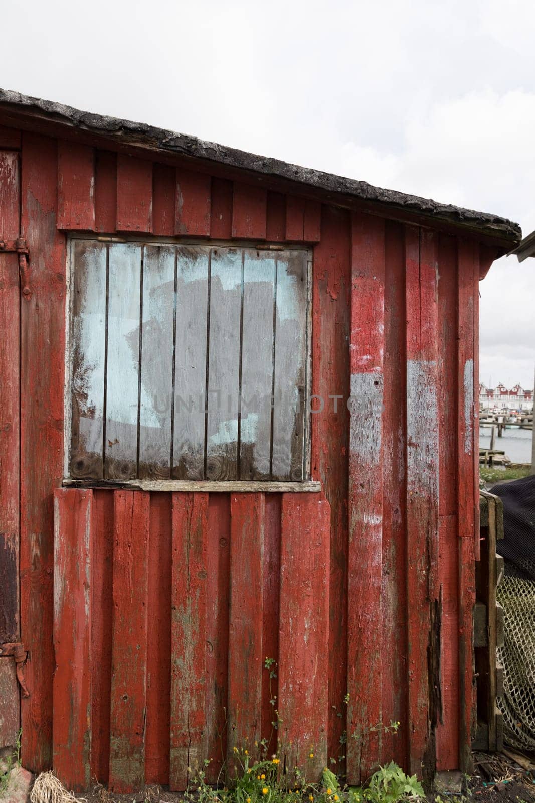 Red wooden hut in the port of Bagenkop,Langeland