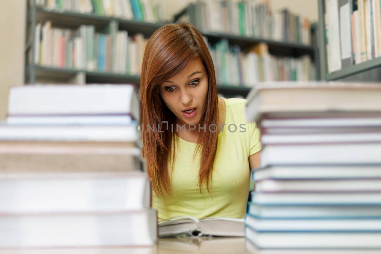 Woman reading scary book