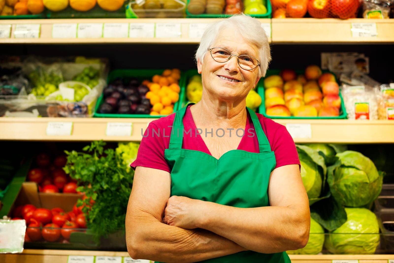 Portrait of mature store worker