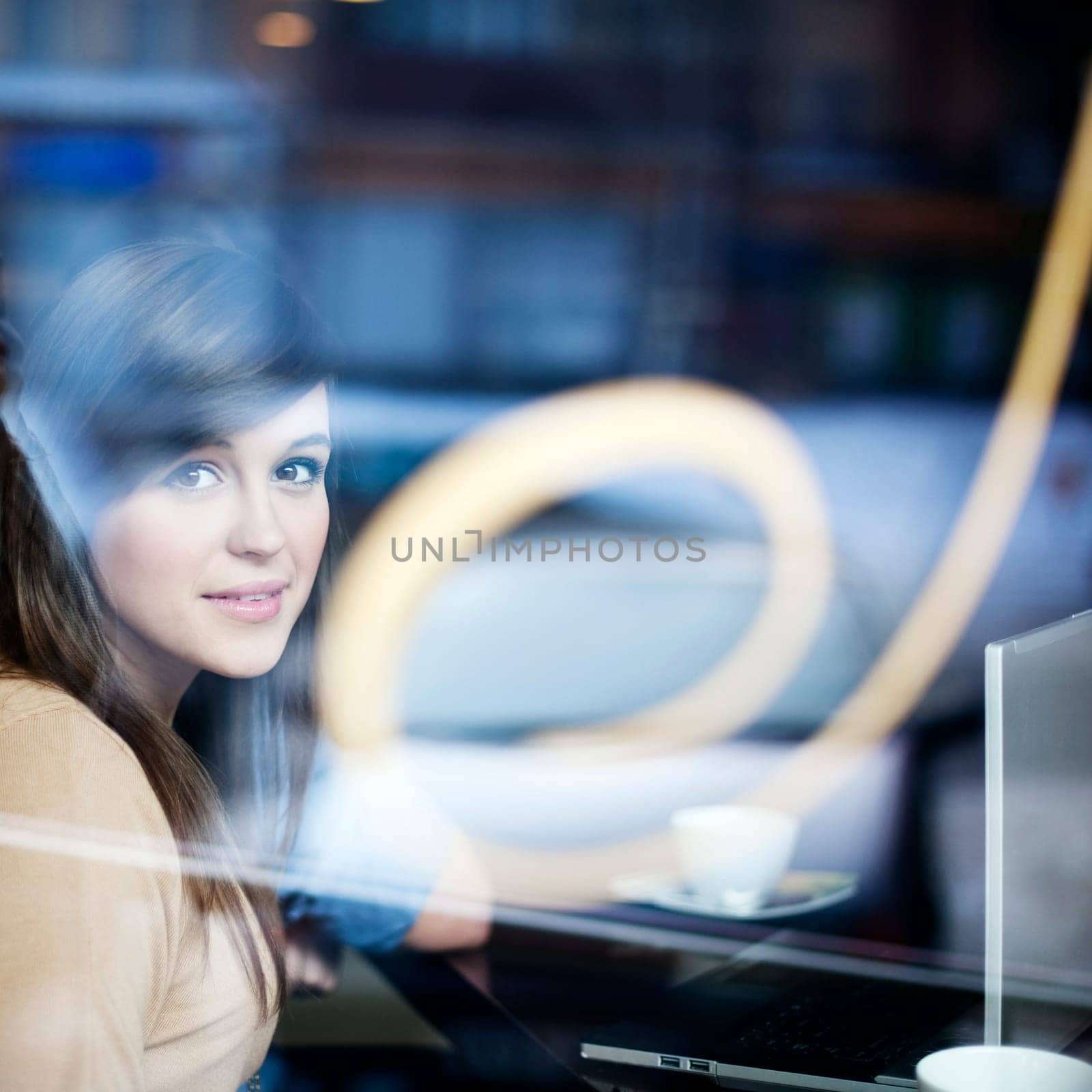 Young woman in coffee shop