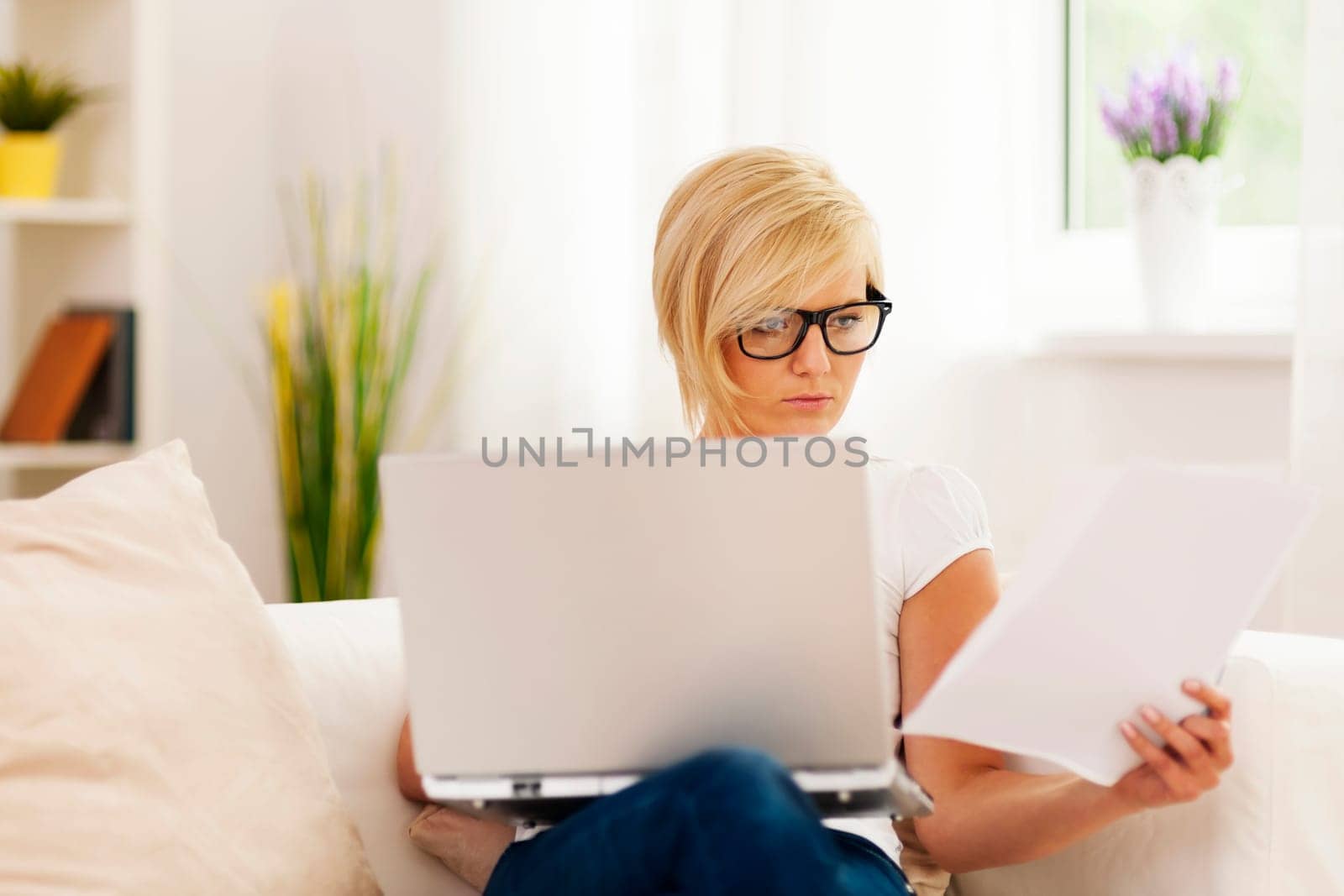 Beautiful woman working at home