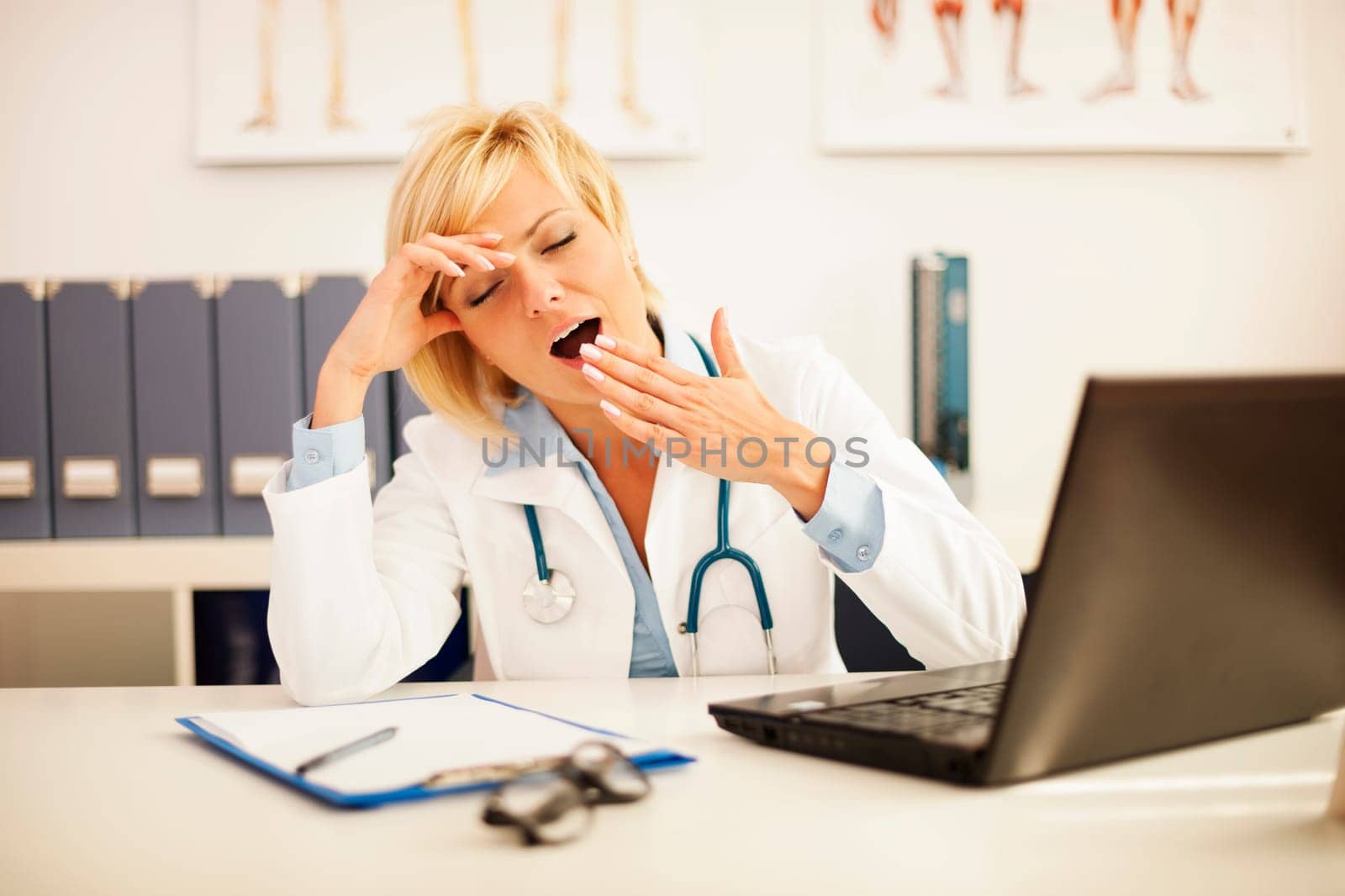 Female doctor had a very exhausting day at work