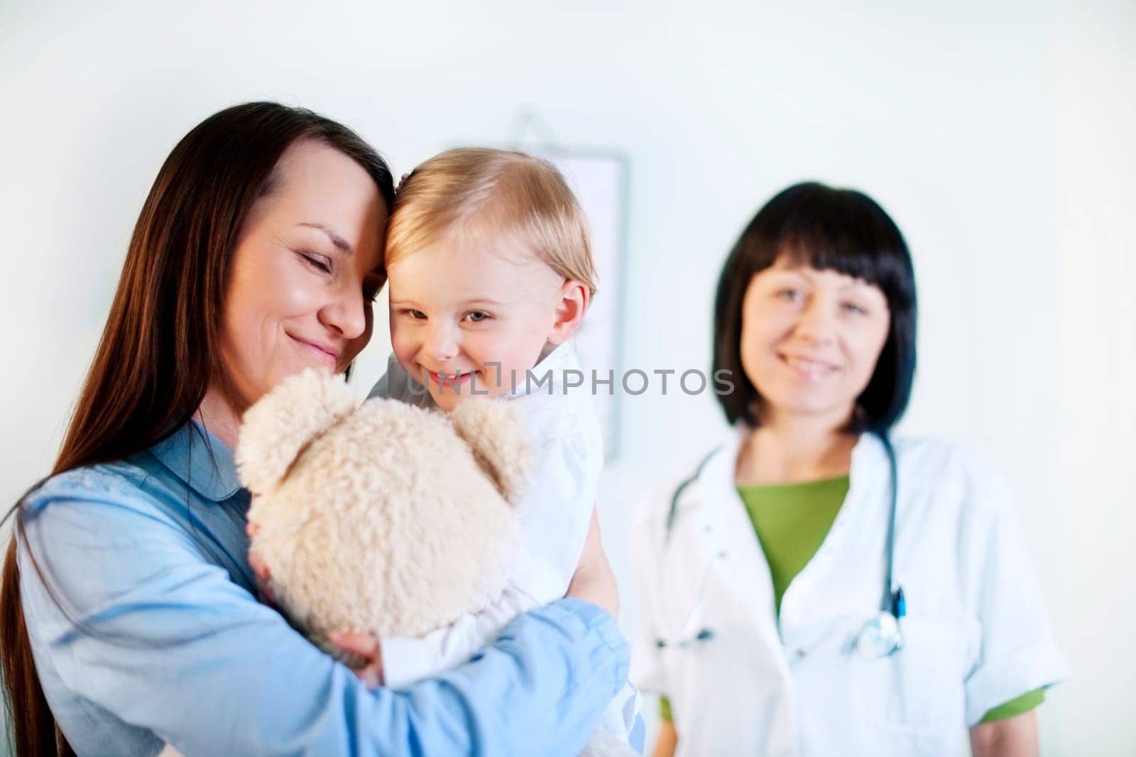 Mother and baby girl at the doctors office