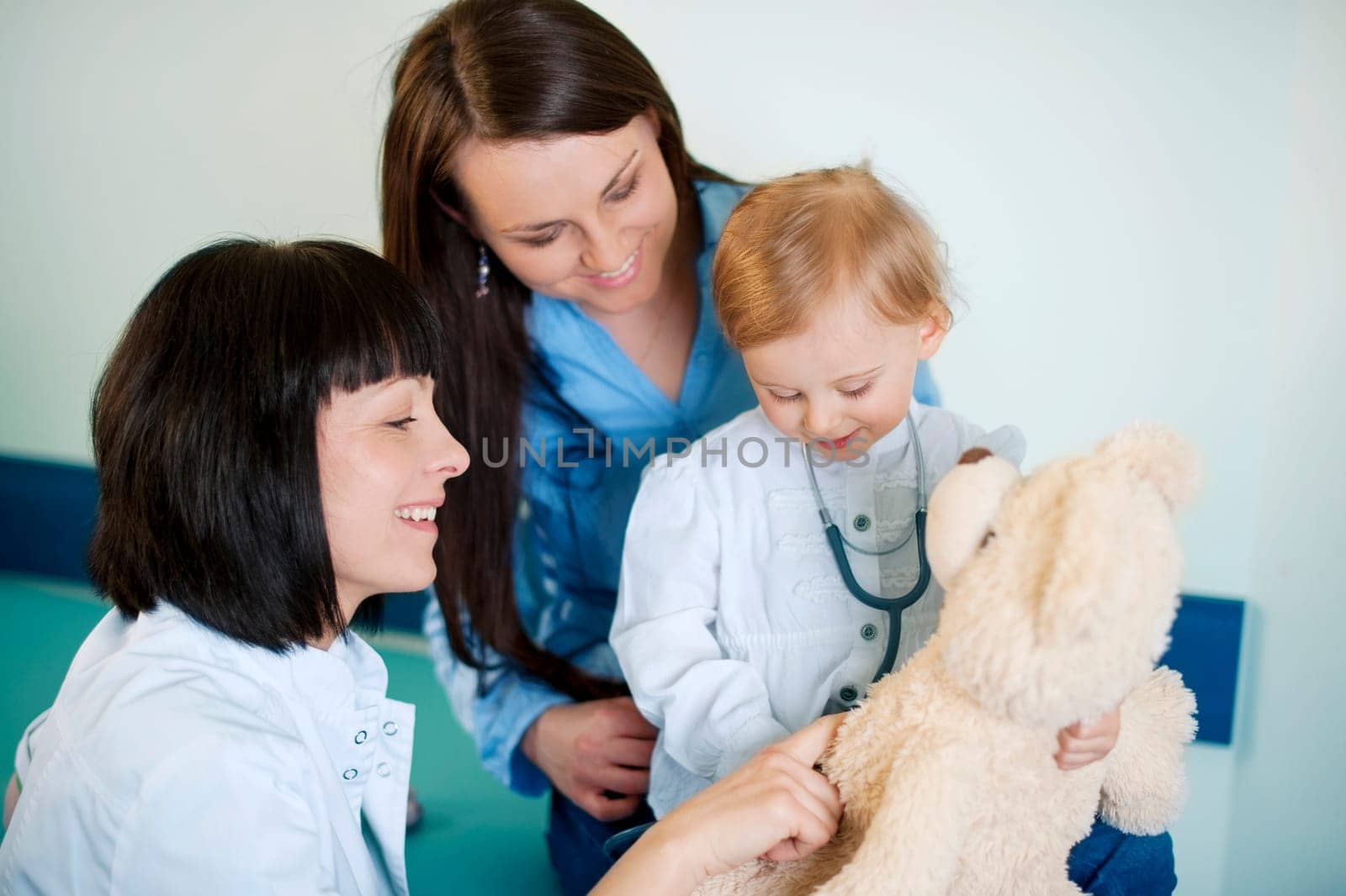 Playing with child at doctors office