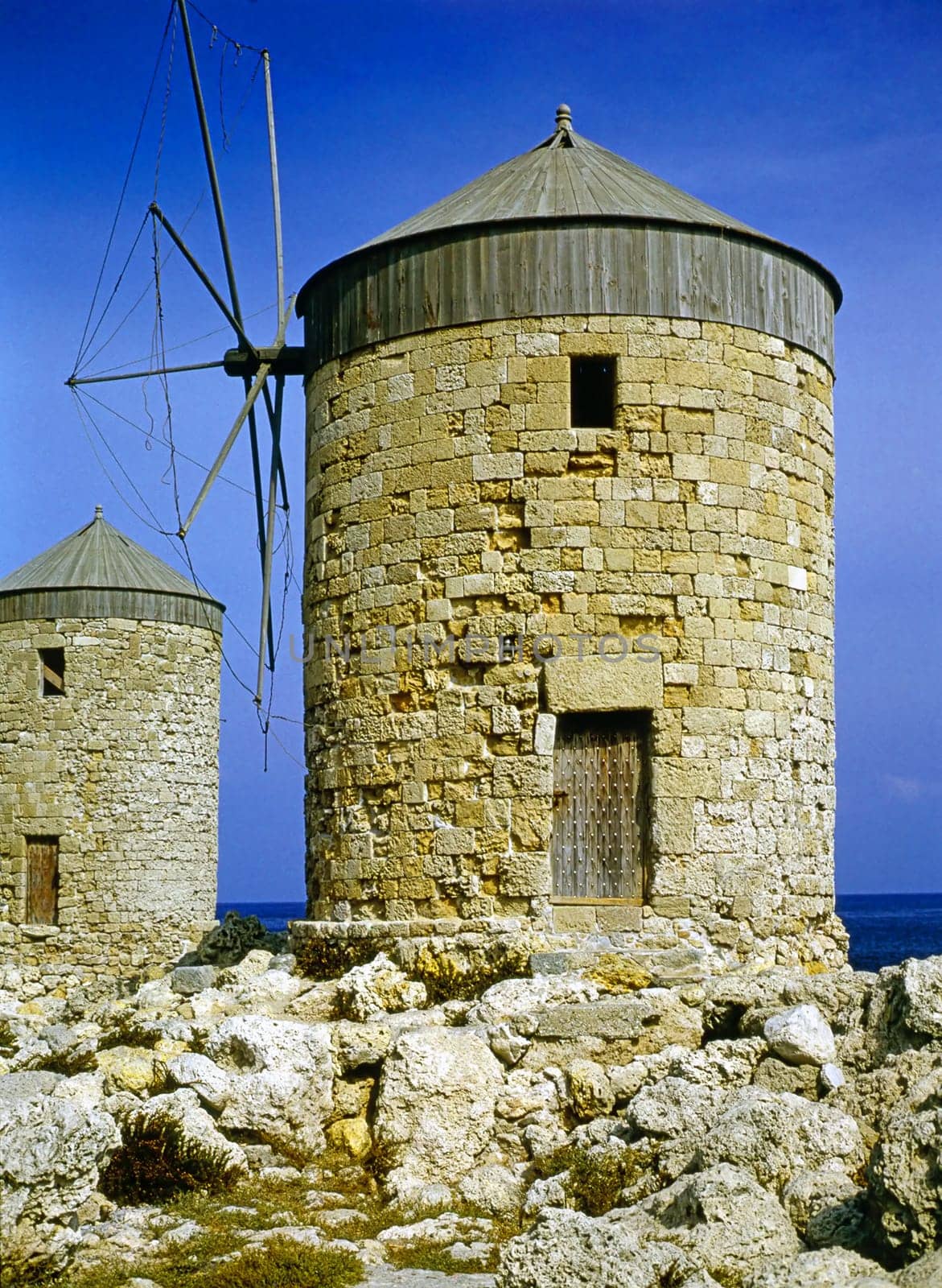 Wind mills in harbor of Rhodes, Greece