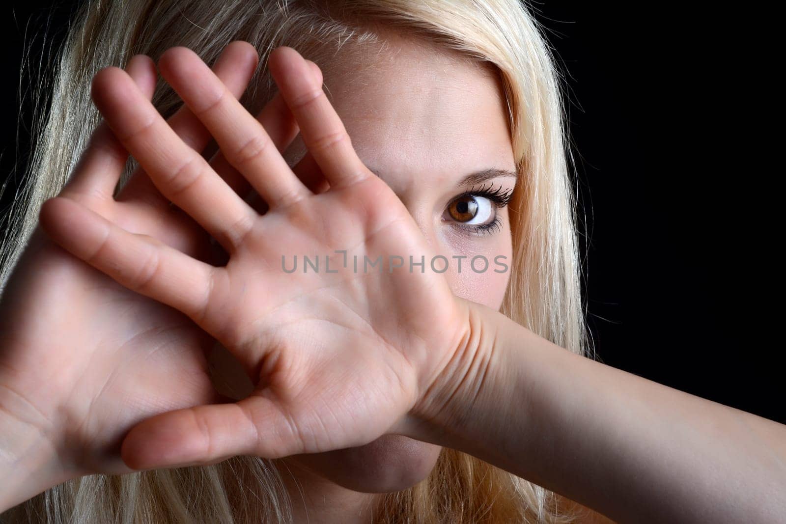young woman shows stop