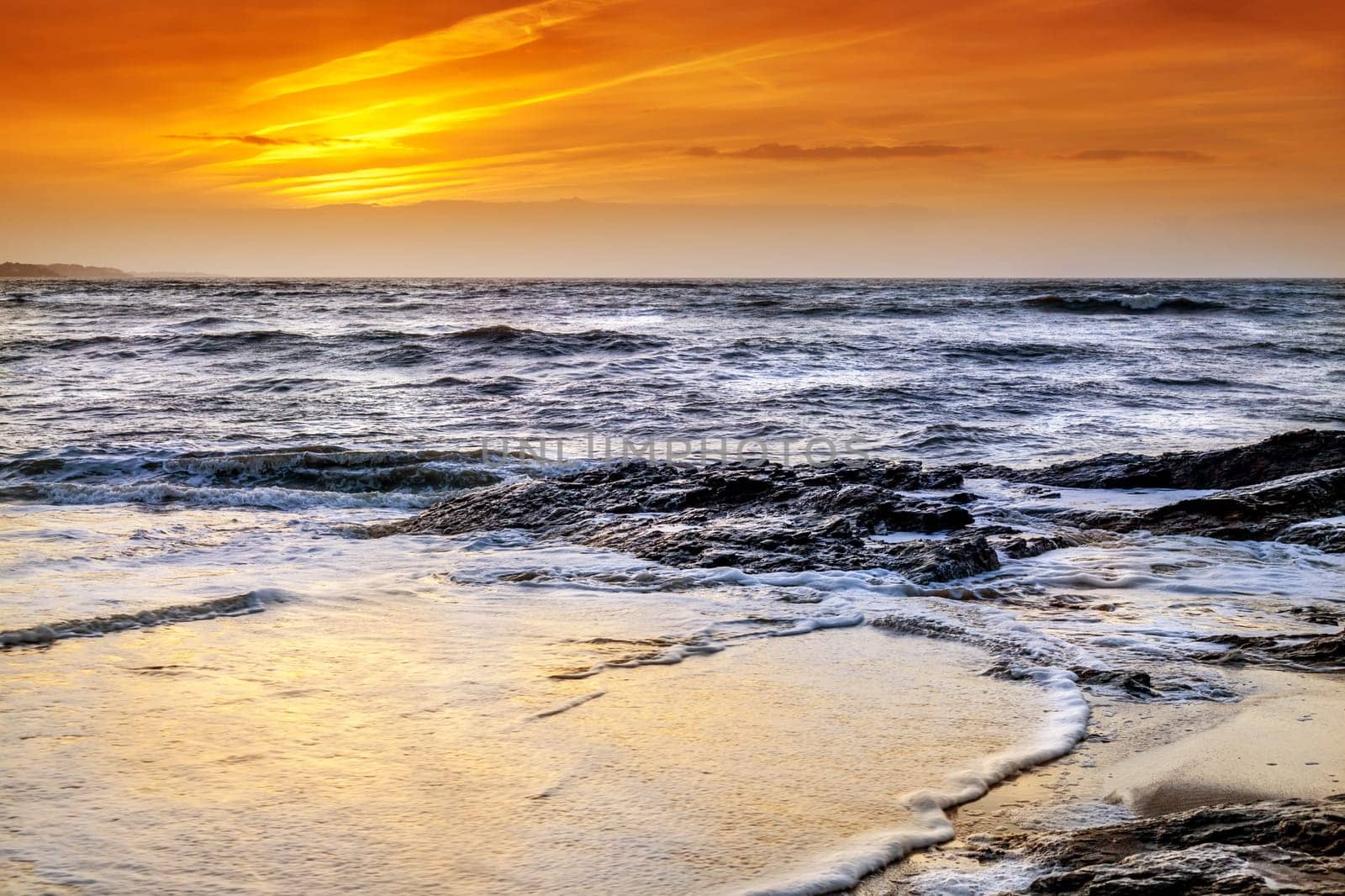 Landscape of sunset over the ocean in France