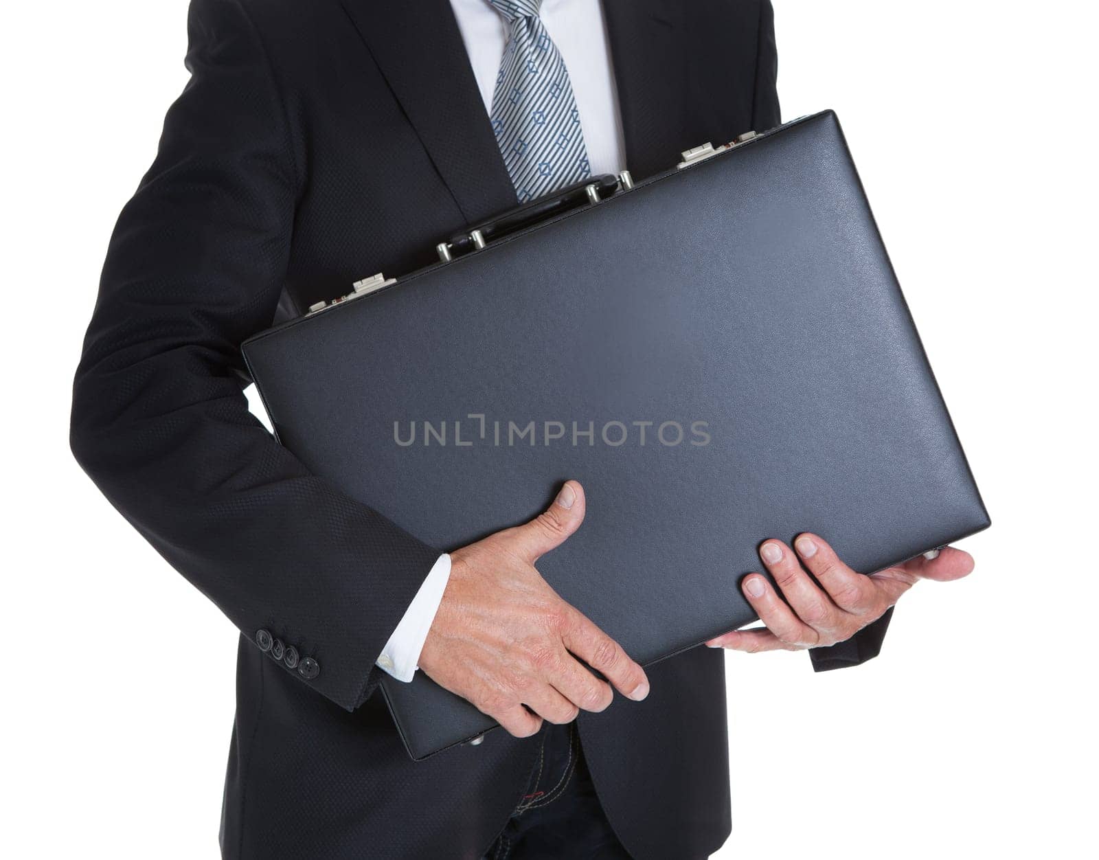 Close-up Of Businessman Holding Briefcase Over White Background