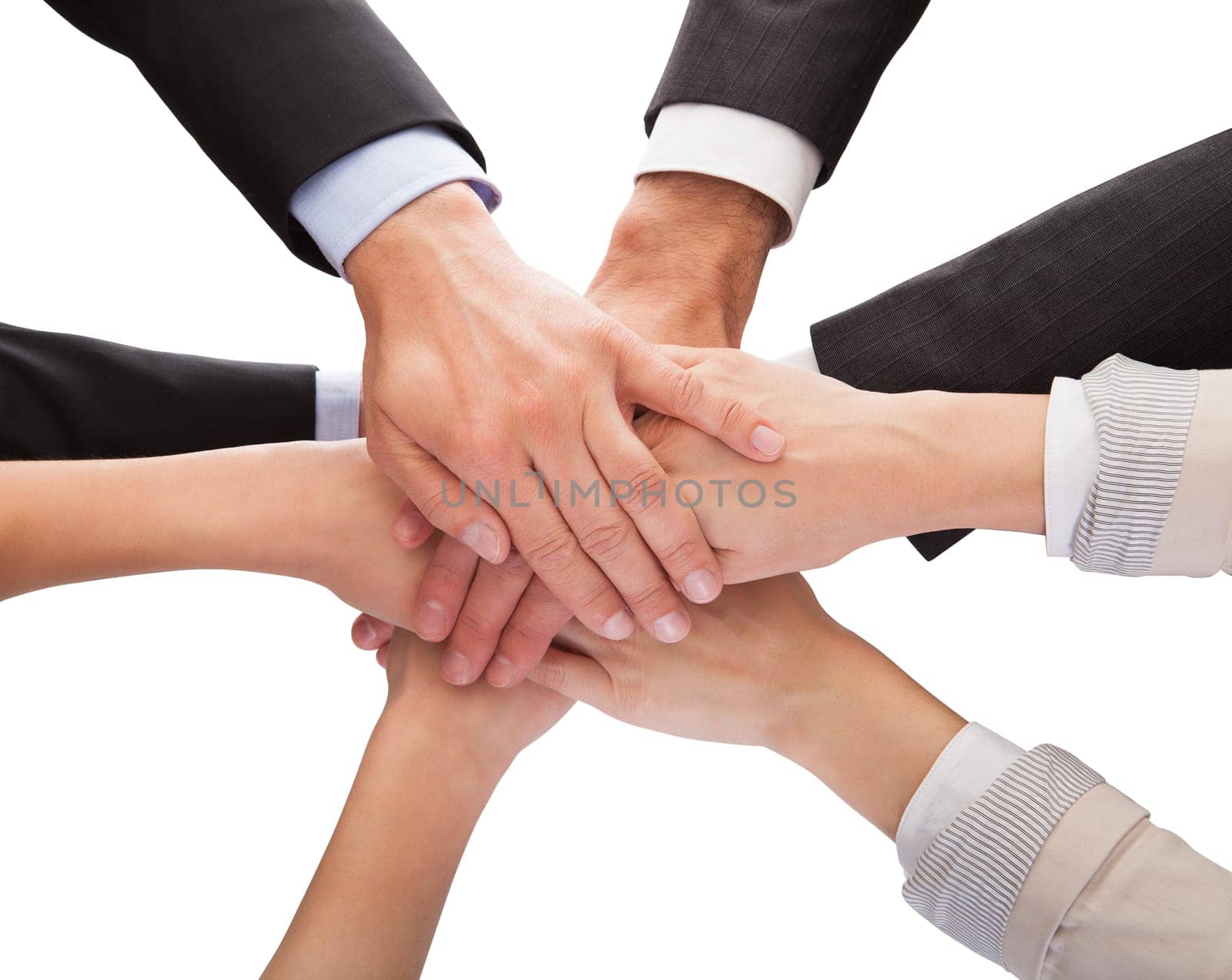 Close-up Of Businesspeople Hands Stacking Together Over White Background