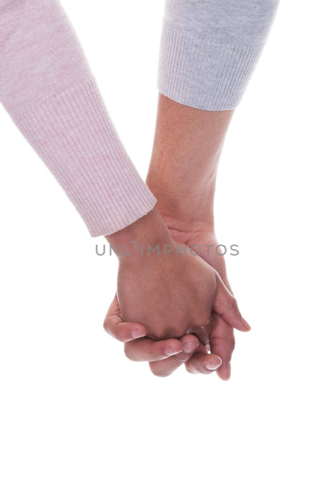 Young Couple Holding Hands Over White Background