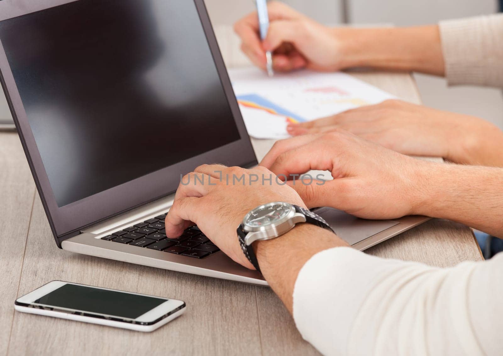 Close Up Of Businessman's Hand Working With Laptop In The Office