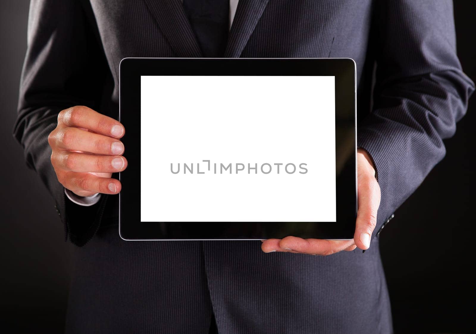 Close-up Of A Businessman Showing Blank Digital Tablet