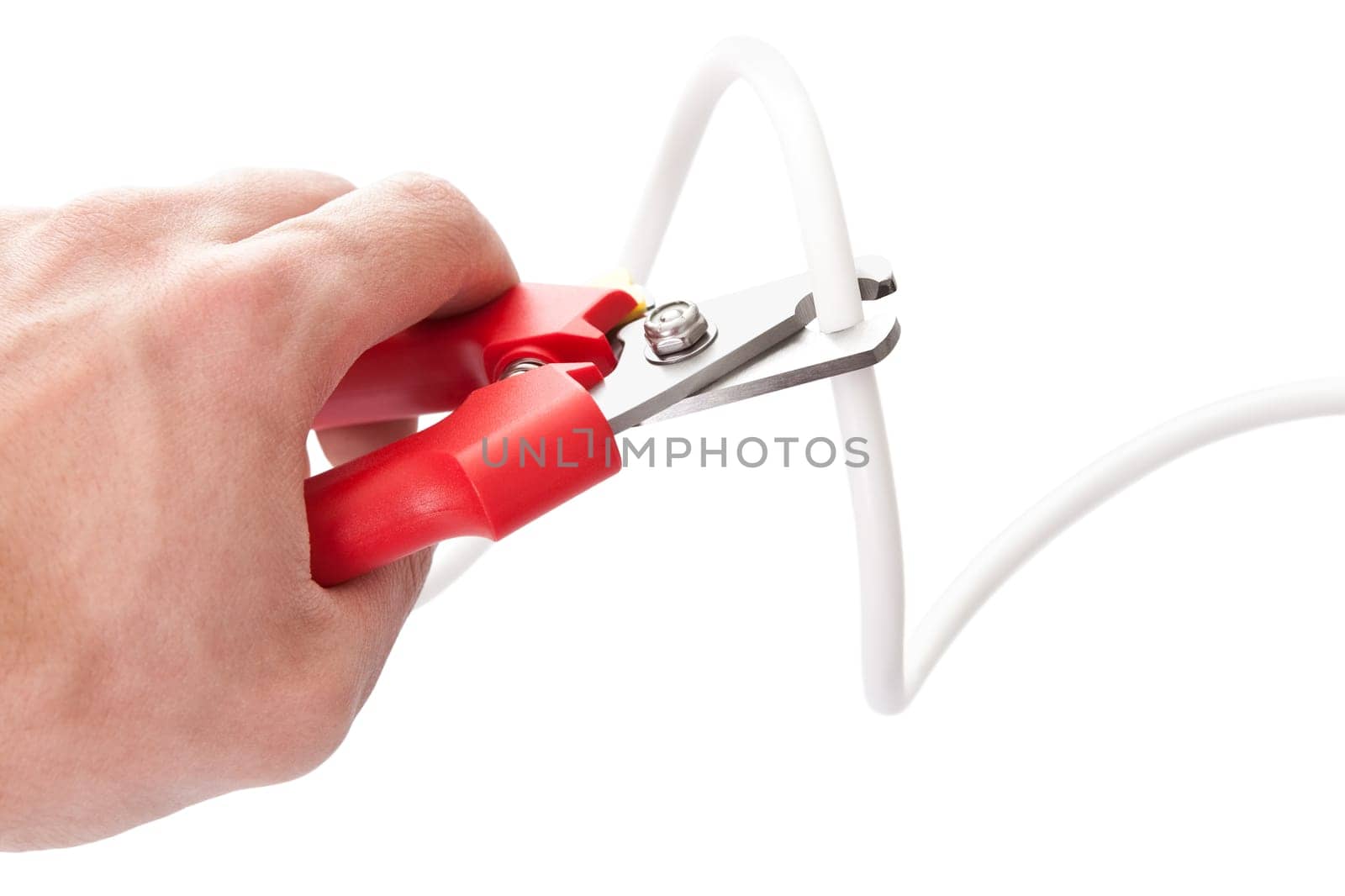Cutting cable using nippers. Isolated on white background