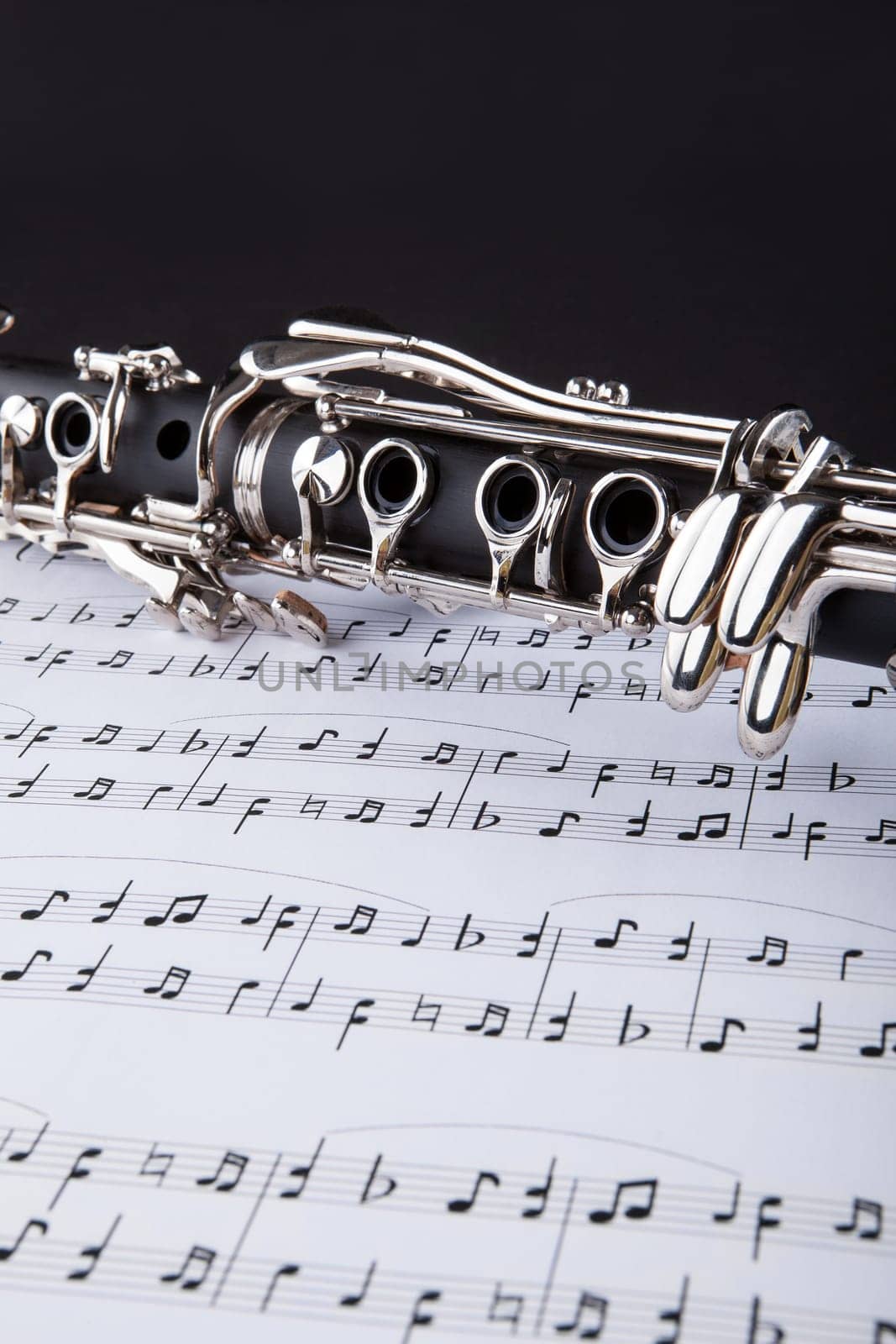 Close-up Photo Of Clarinet And Musical Note