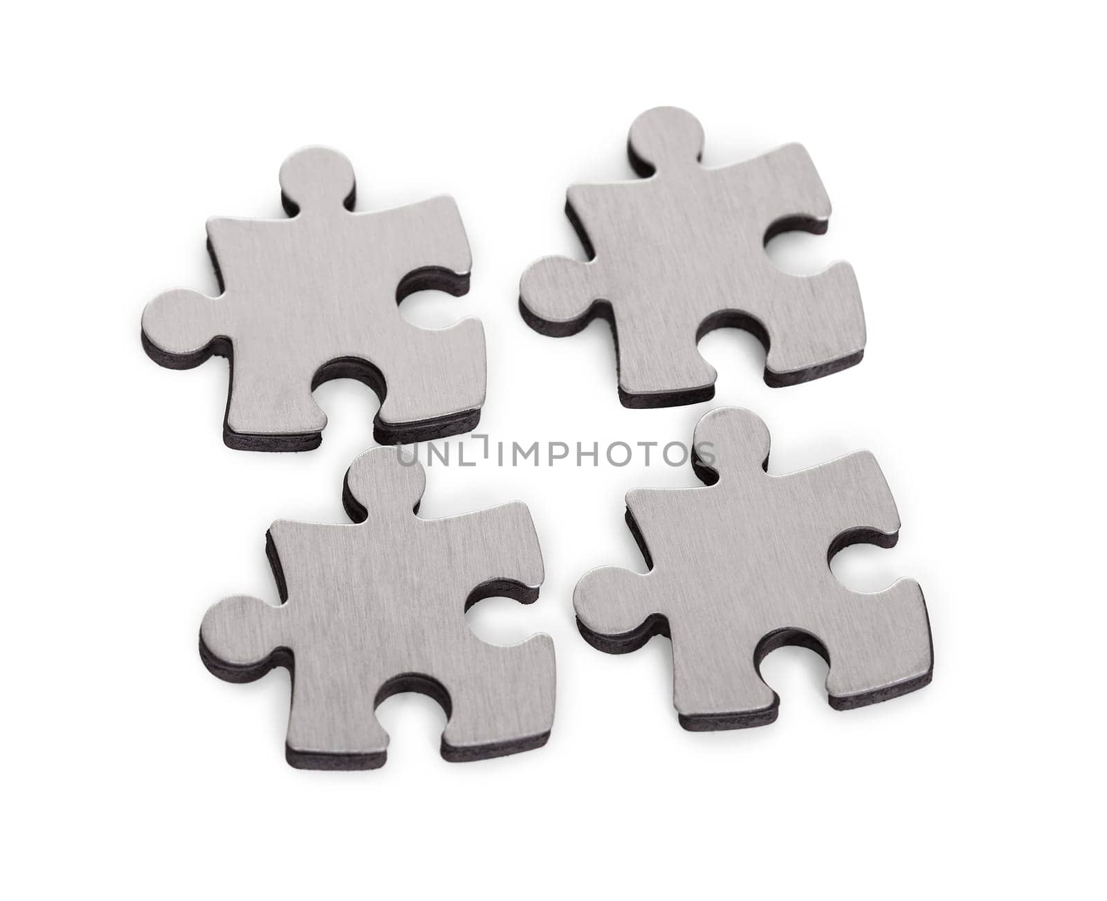 Close-up Of Jigsaw Isolated Over White Background