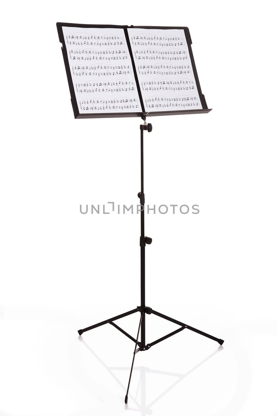 Musical Notes On Stand Over White Background