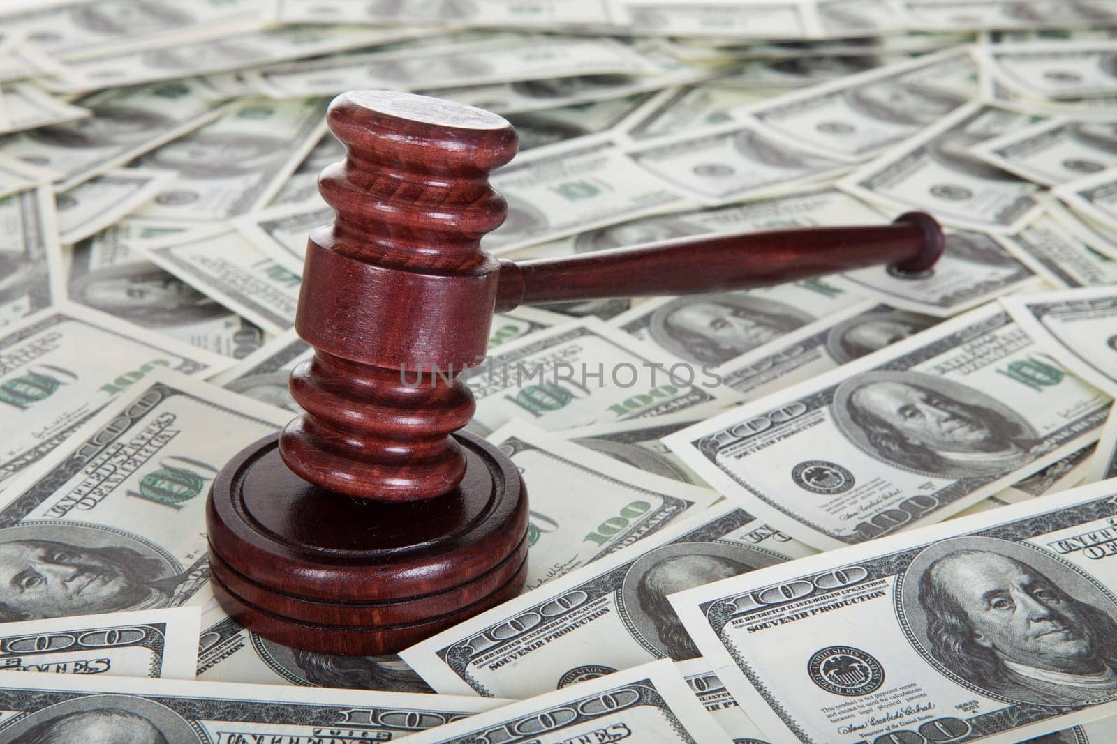 Judge gavel and dollar bills. Corruption concept
