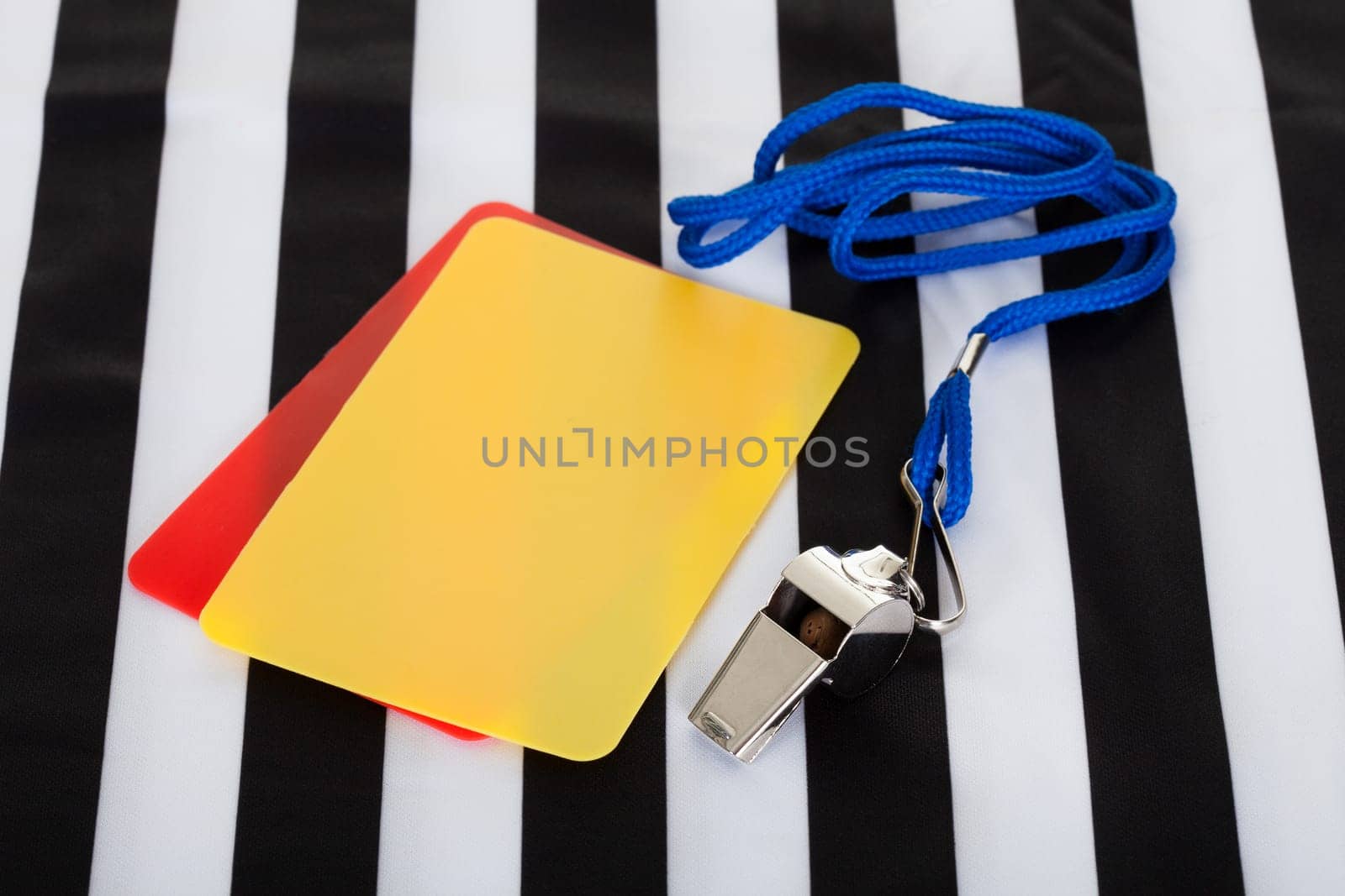 Soccer ball, whistle and cards. Isolated on white