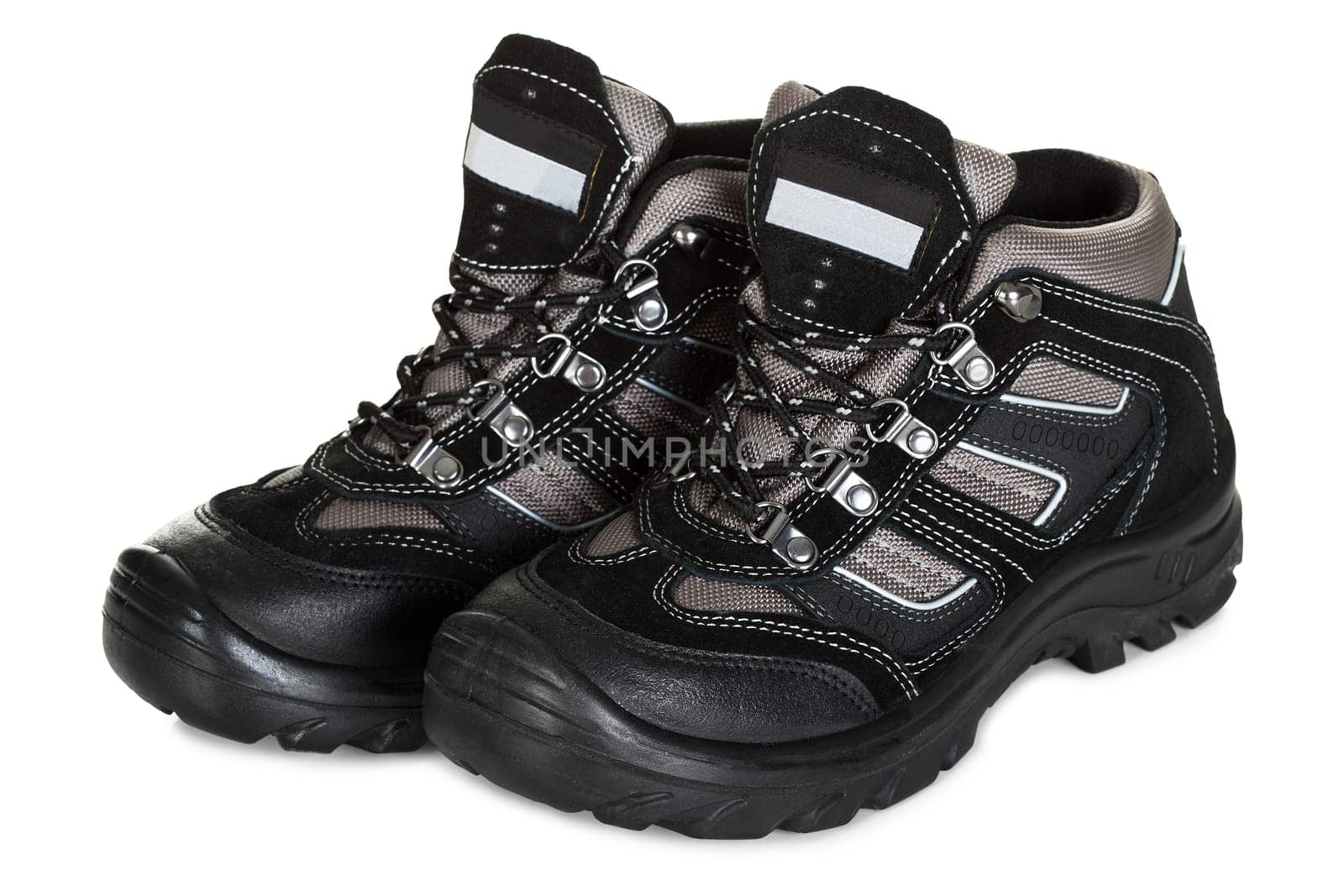 Pair of trekking shoes. Isolated on white
