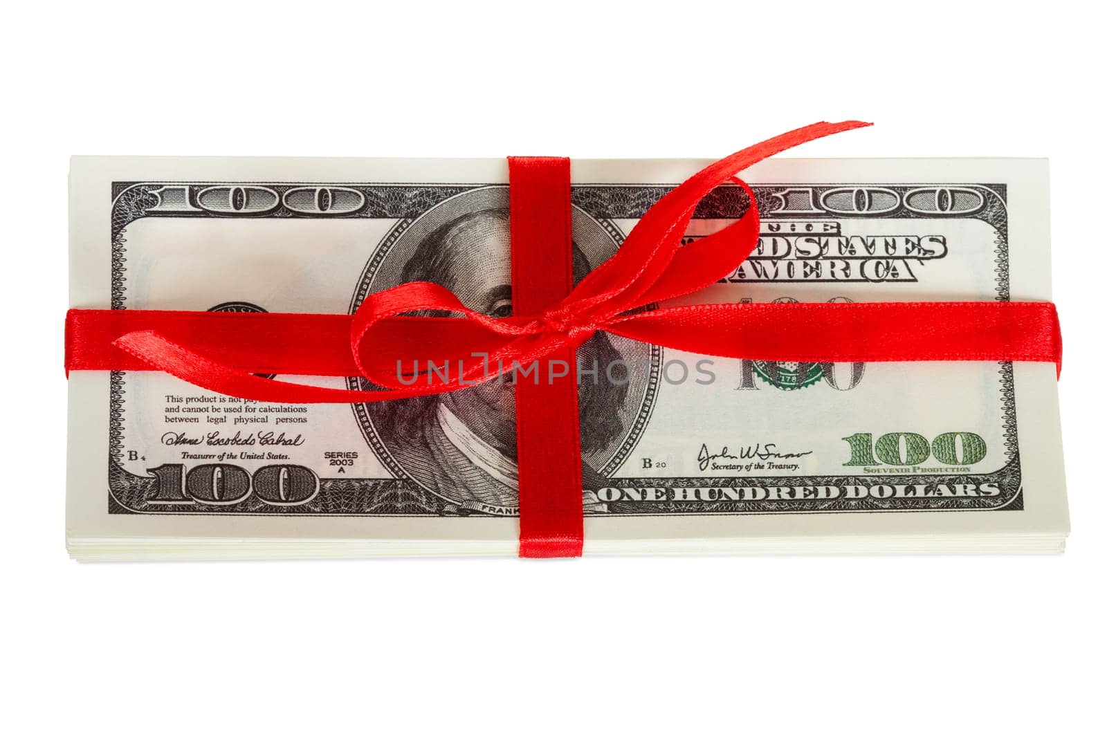 Pack of dollars wrapped a  gift. Isolated on white background