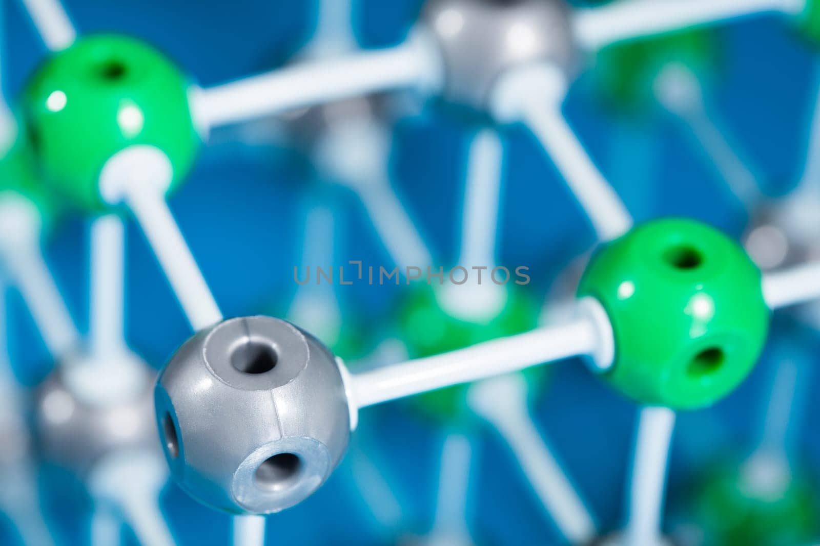 Model of molecular structure on blue reflective background
