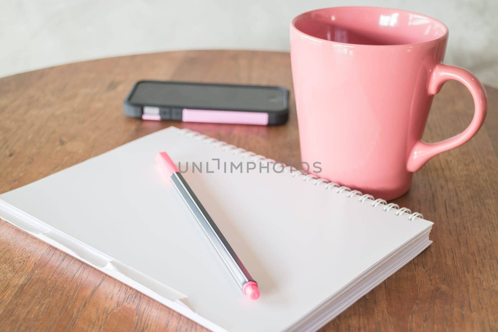 Creative work table in coffee shop, stock photo