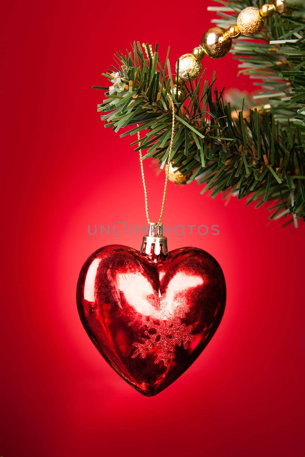 Close-up Of Heart Shape Bauble On Christmas Tree