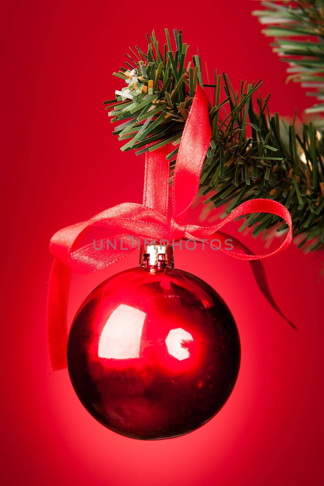 Close-up Of Red Decorative Bauble Hanged On Christmas Tree