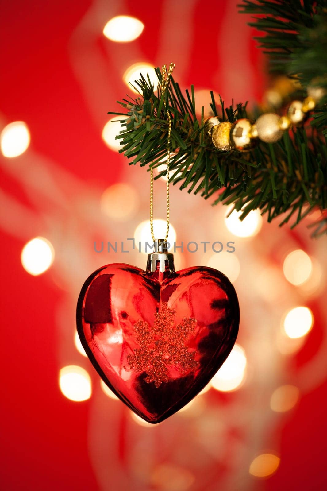 Close-up Of Heart Shape Bauble On Christmas Tree