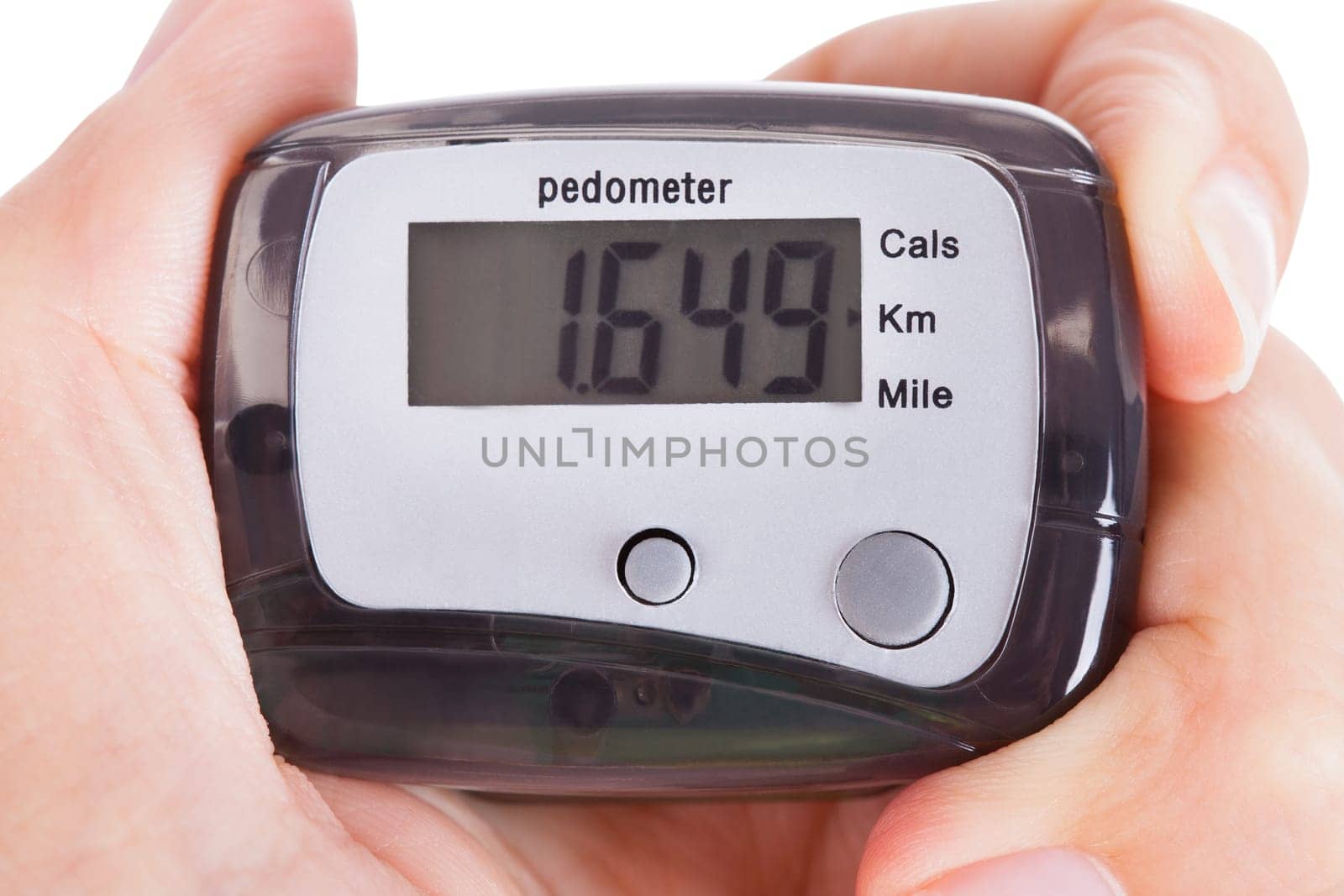 Close-up Of Hand  Holding Digital Pedometer On White Background
