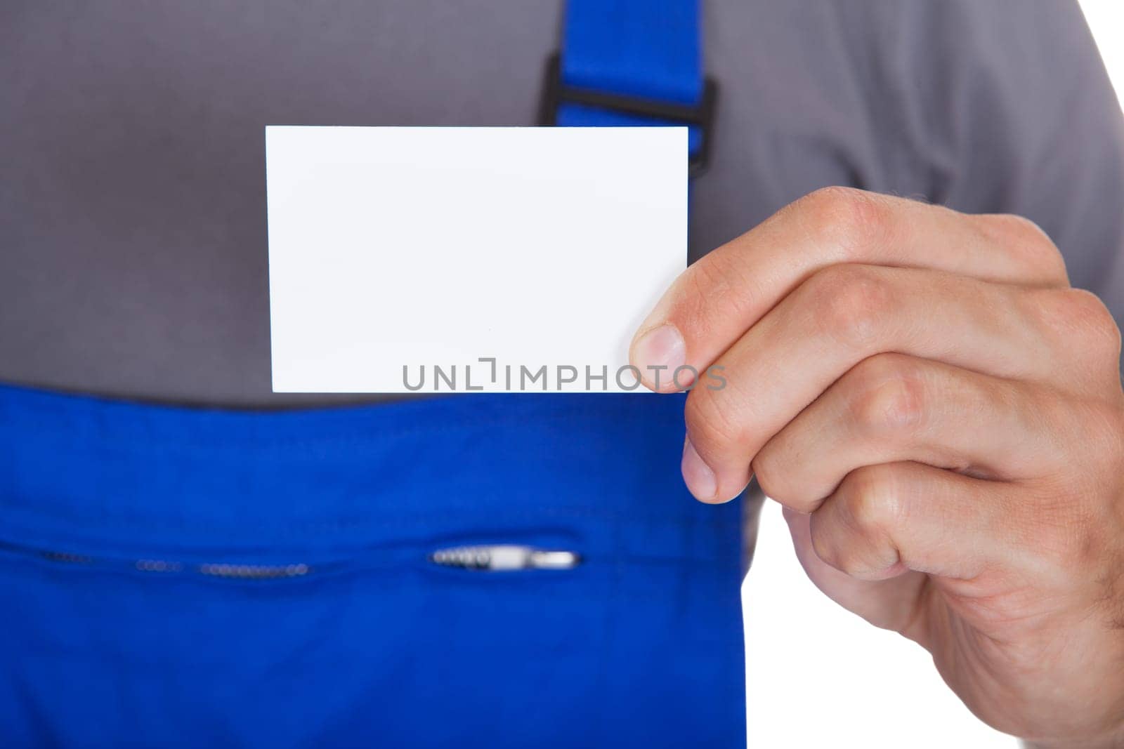 Portrait Of Happy Mechanic In Workwear Holding Visiting Card