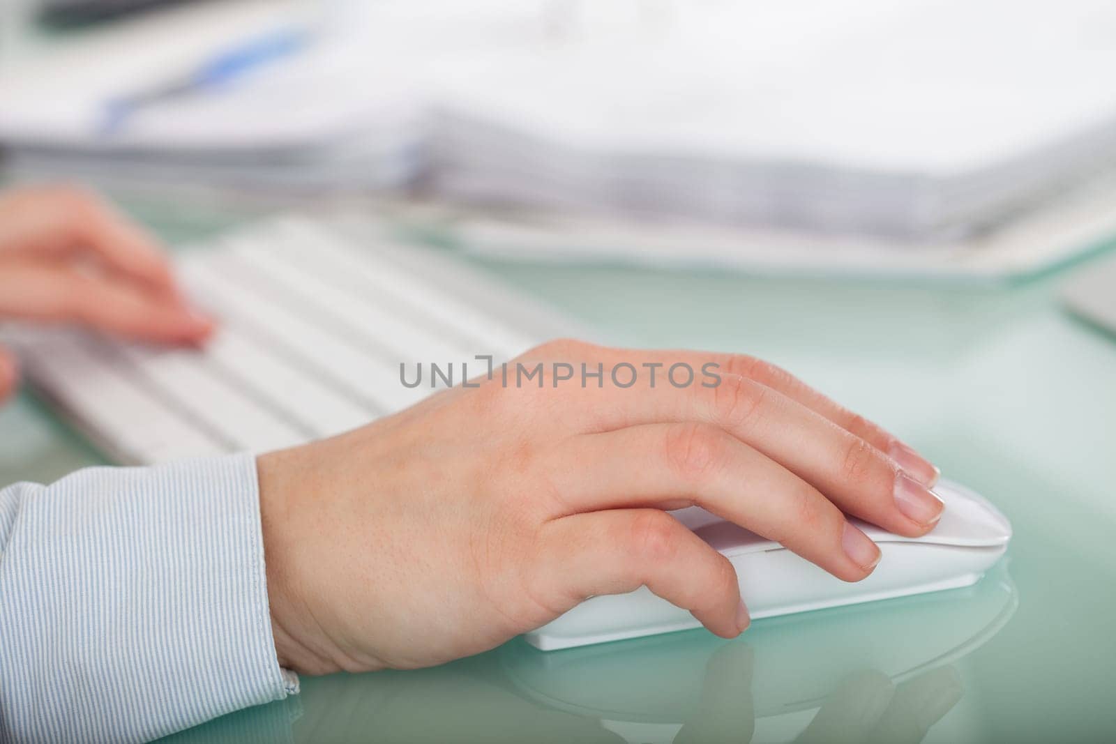 Close-up Photo Of Hands Using Keyboard and Mouse