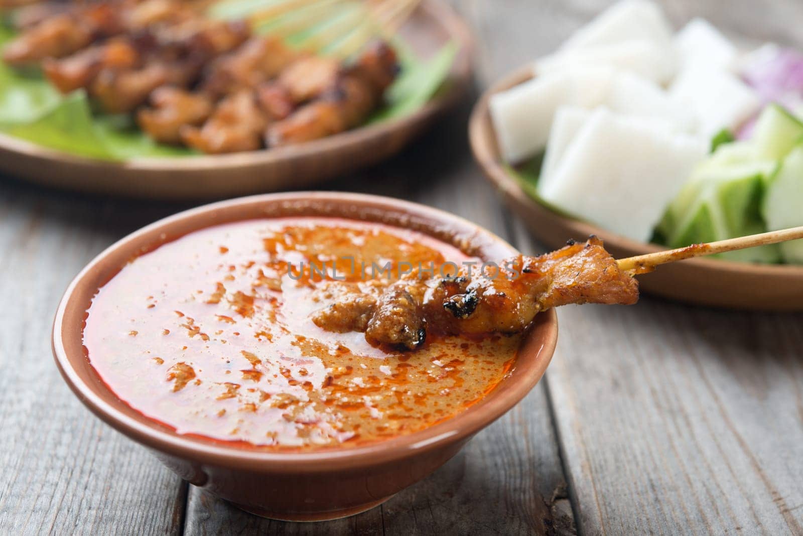 Malaysian chicken sate with delicious peanut sauce, one of famous local dishes.