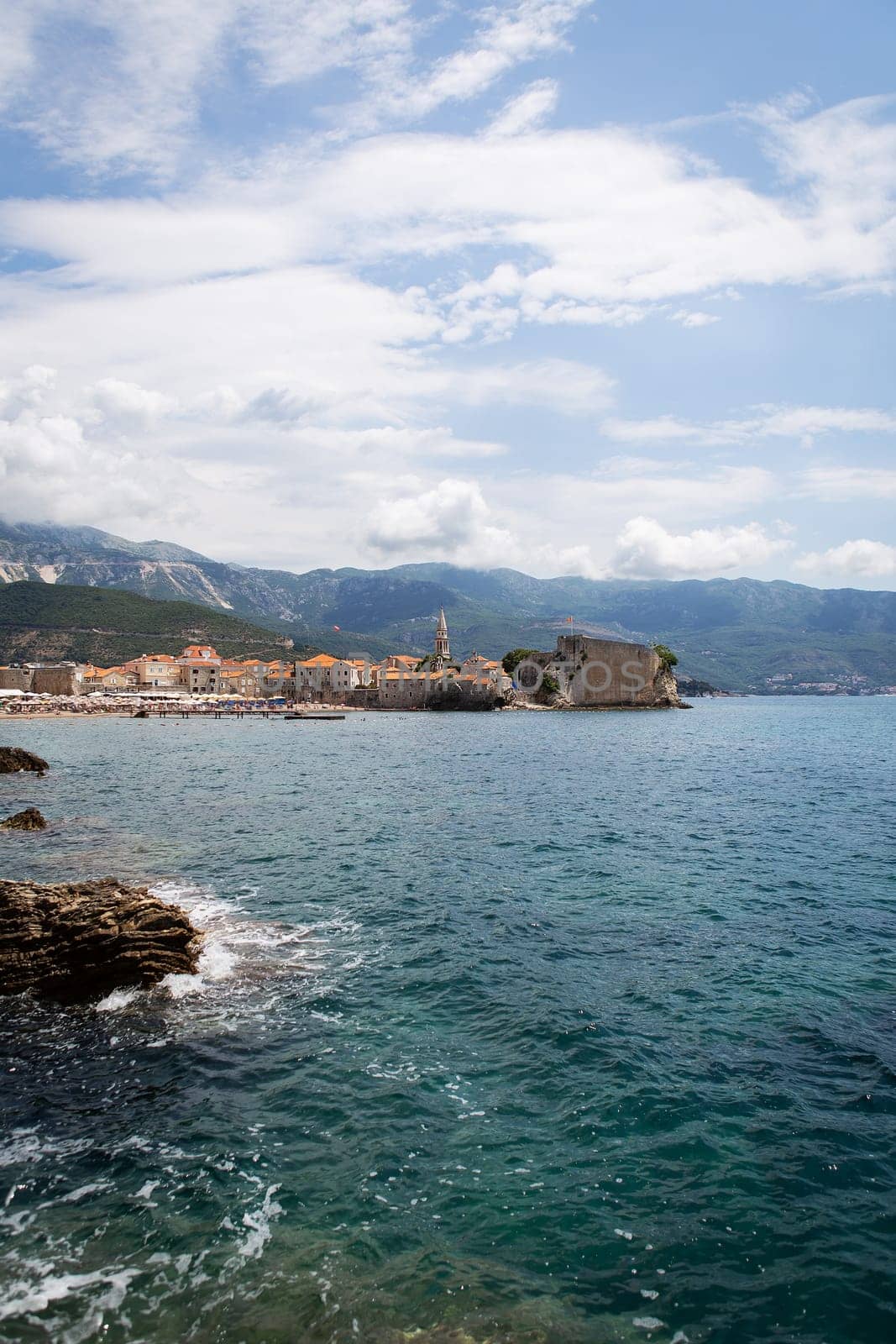 Montenegro, Budva, very beautiful view of the old town and citadel in Budva. Beautiful clouds on a warm day