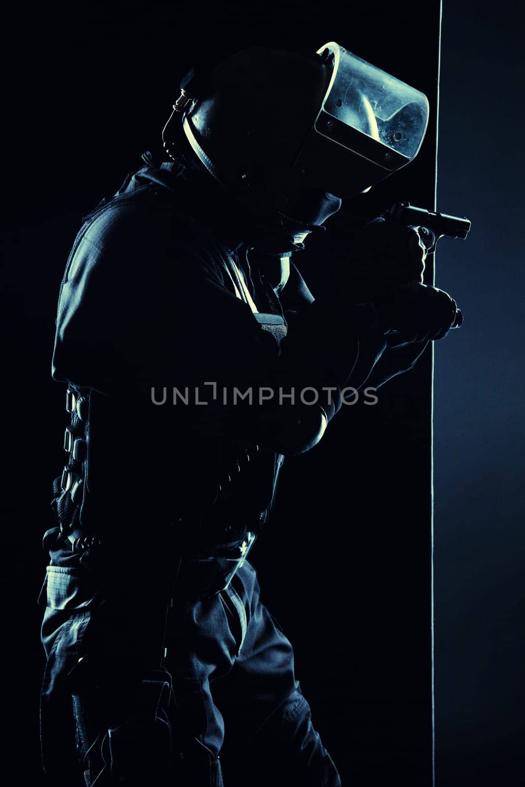 Contour shot of spec ops soldier on black background
