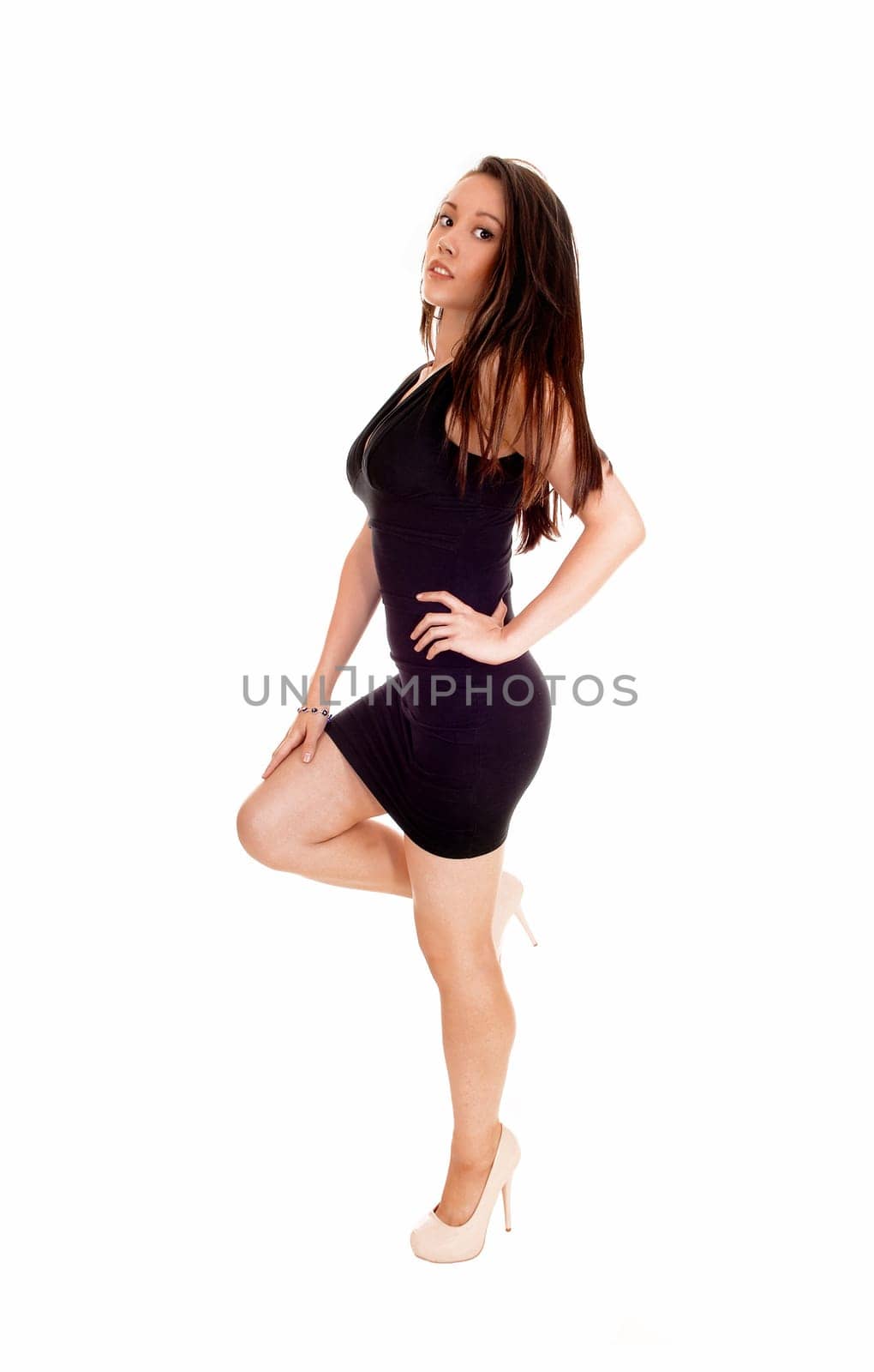 A lovely young Asian woman with a gorgeous figure standing in a black.dress, isolated for white background..