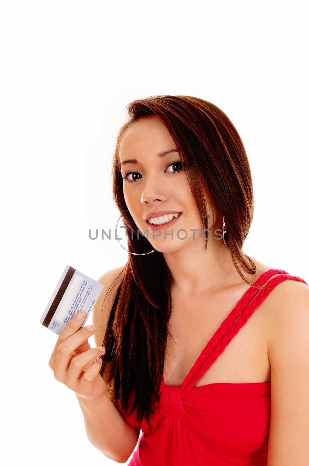 A smiling Asian woman in a red dress holding her credit card, ready for.shopping, isolated for white background..