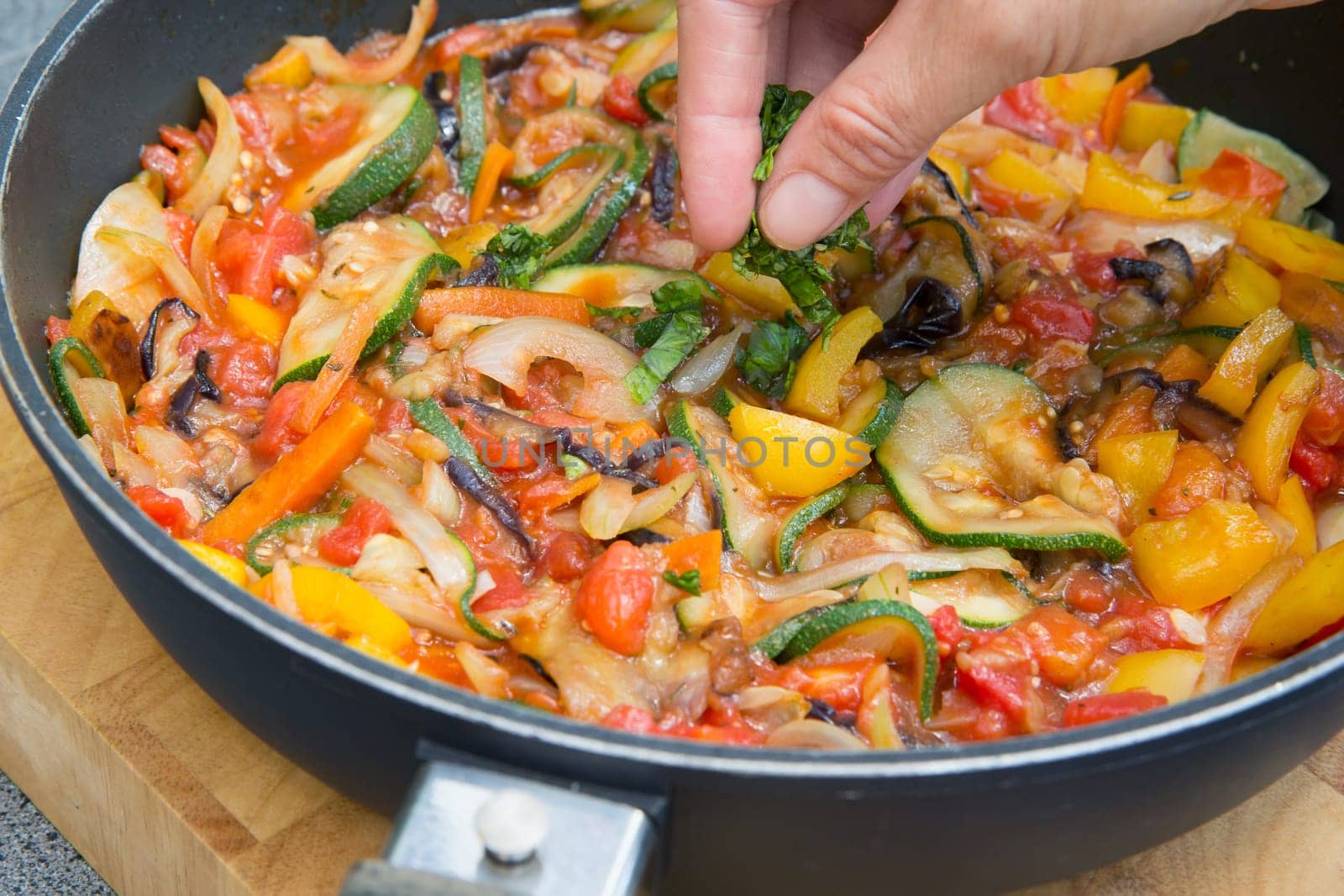 Cooking the typical Provencal meal - Ratatouille. Typical Provencal food