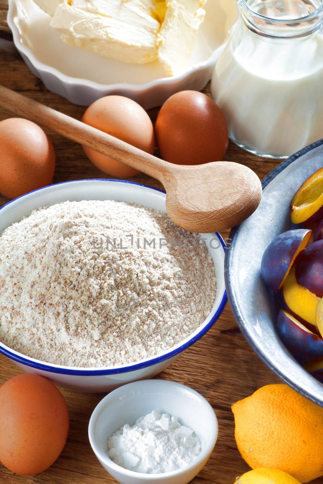 Background from ingredients for a plum cake