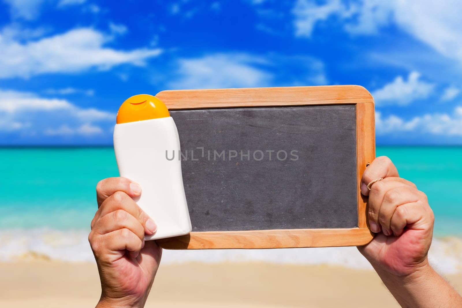 Sunmilk and empty slate by the sea