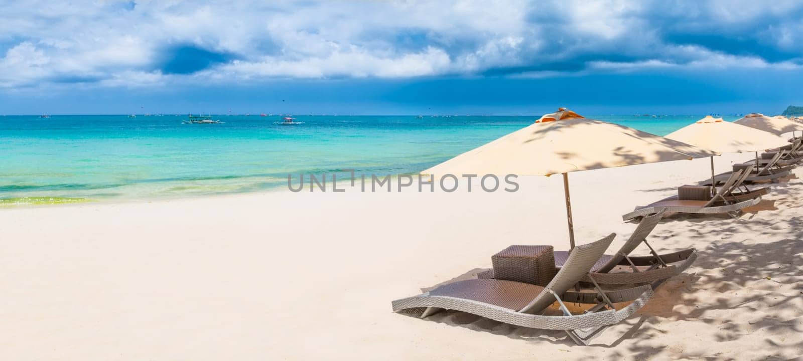 Panoramic view of a white sand beach