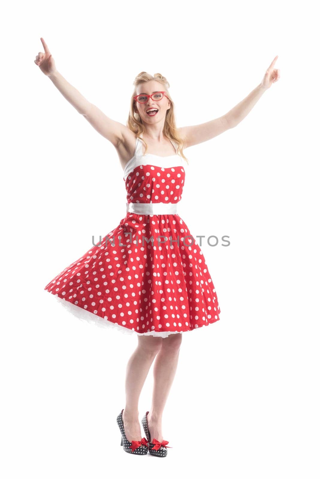 a woman in summer dress is happy and cheering